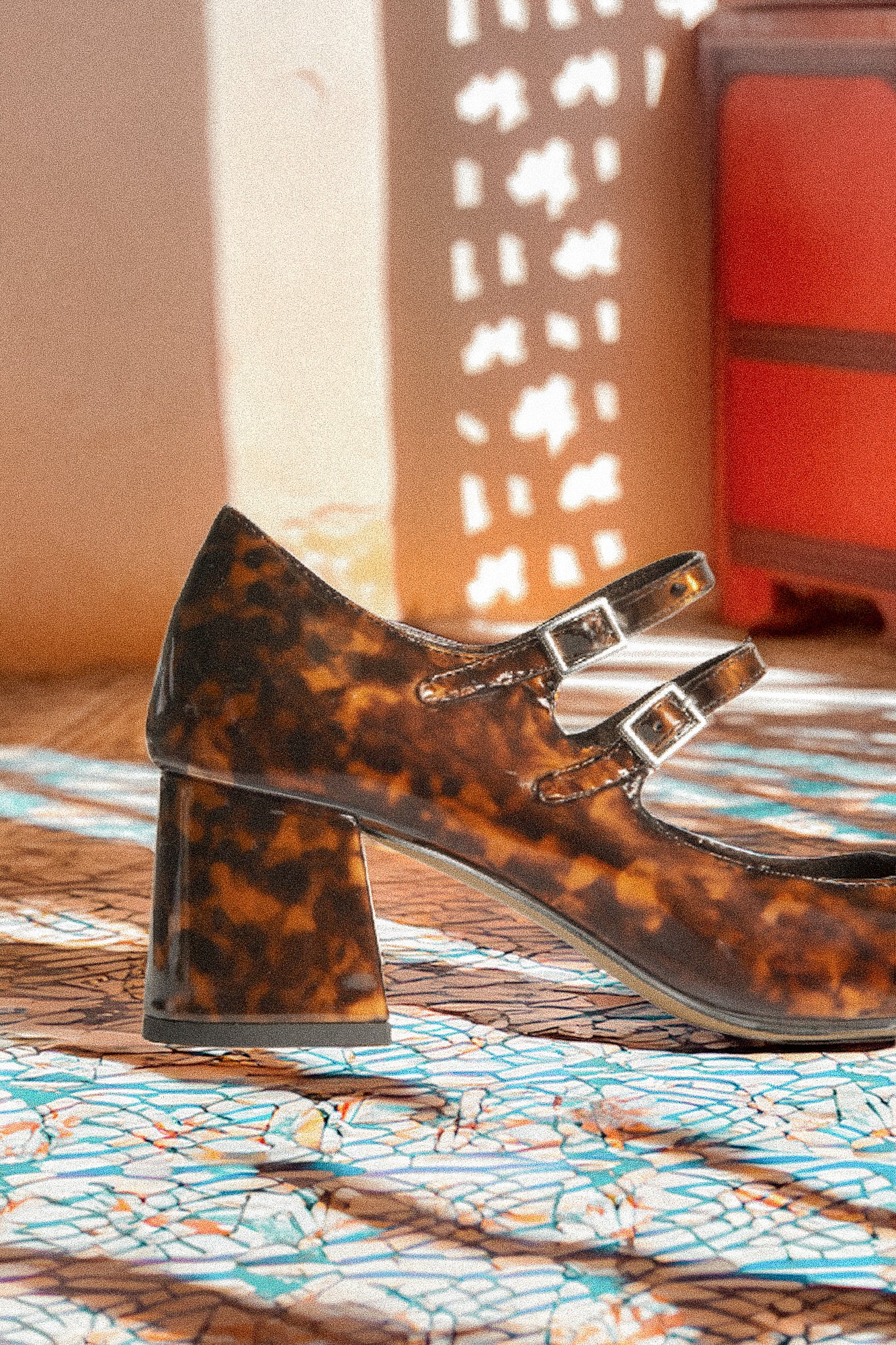 Patent leather shoes with Leopard heel