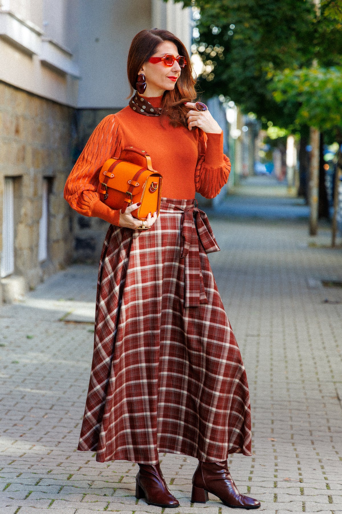 Long plaid flared skirt with a belt