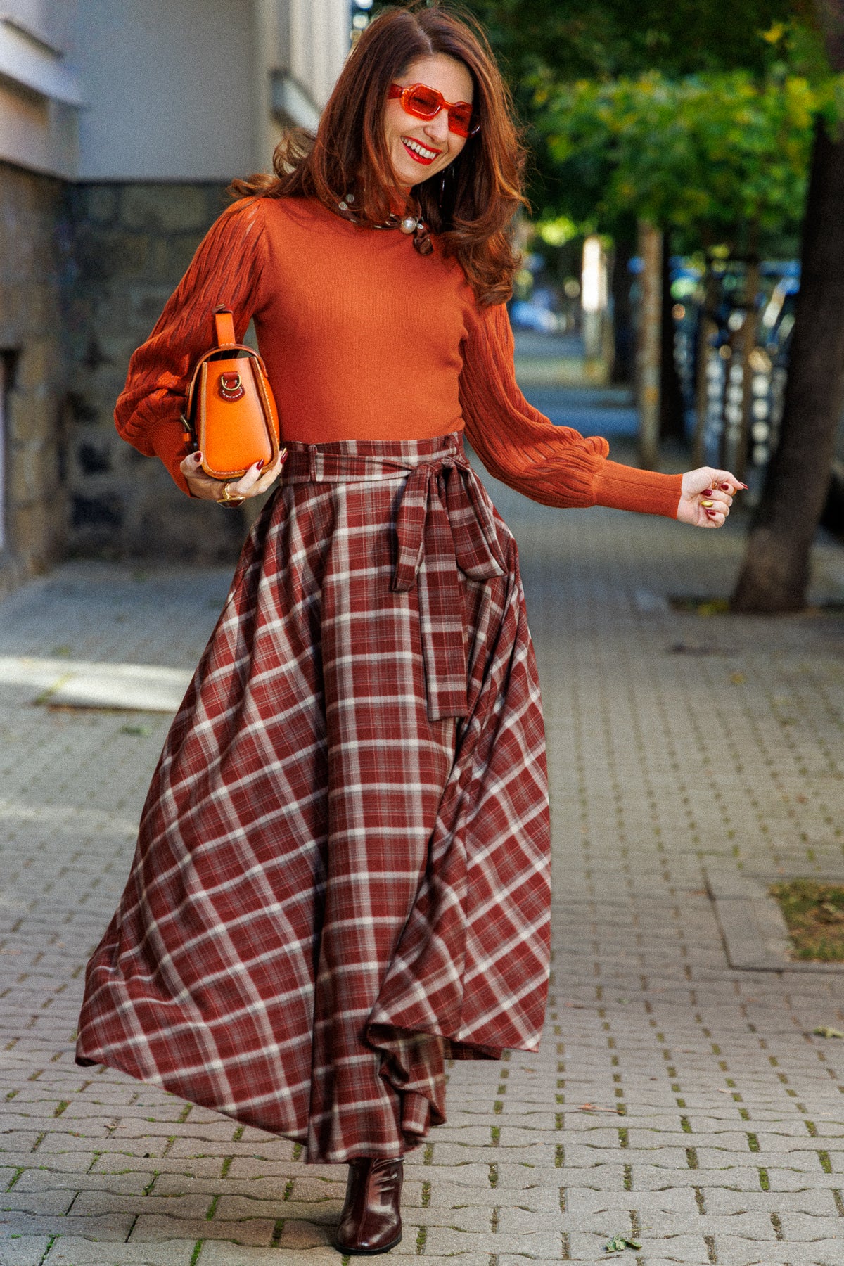Long plaid flared skirt with a belt