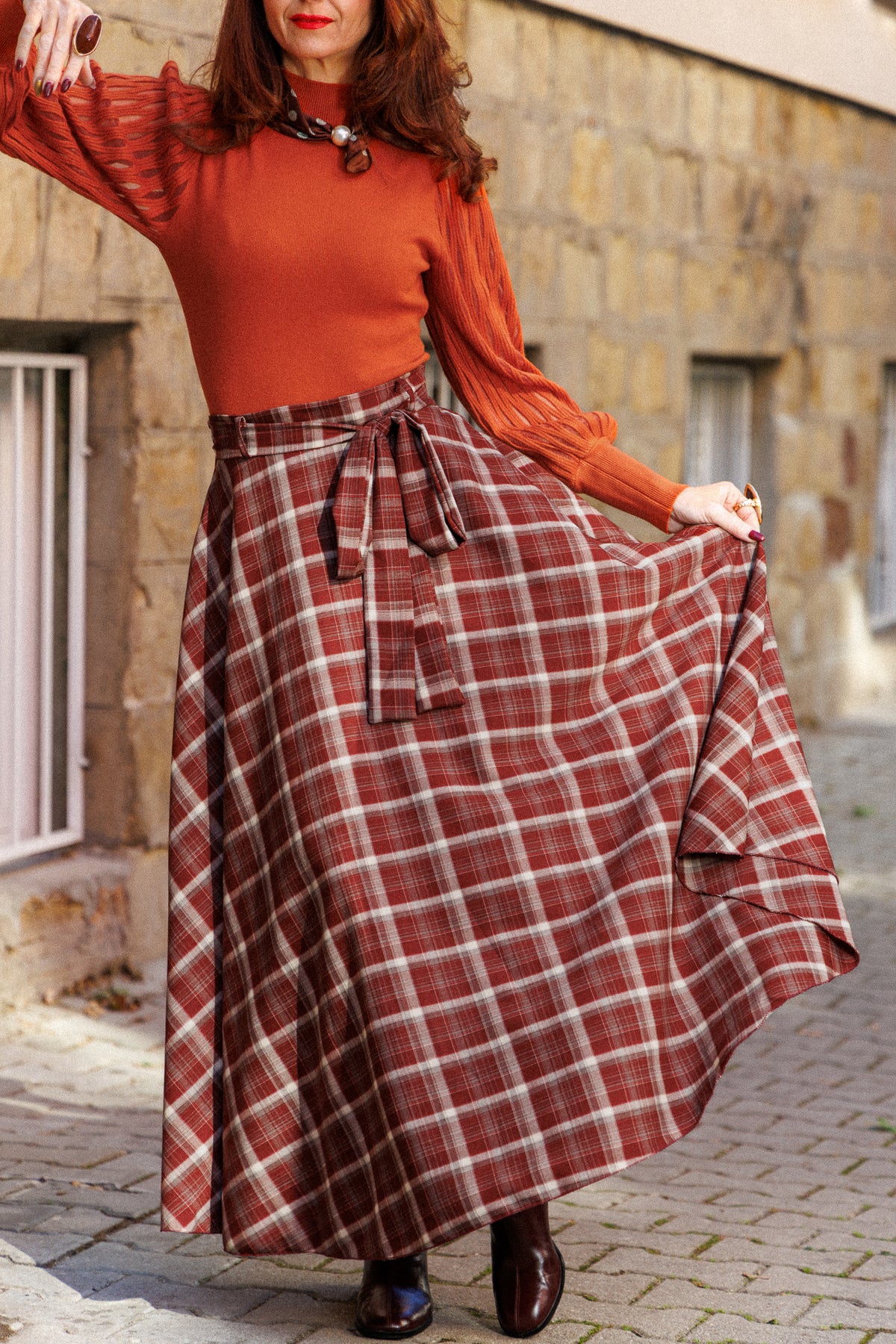 Long plaid flared skirt with a belt