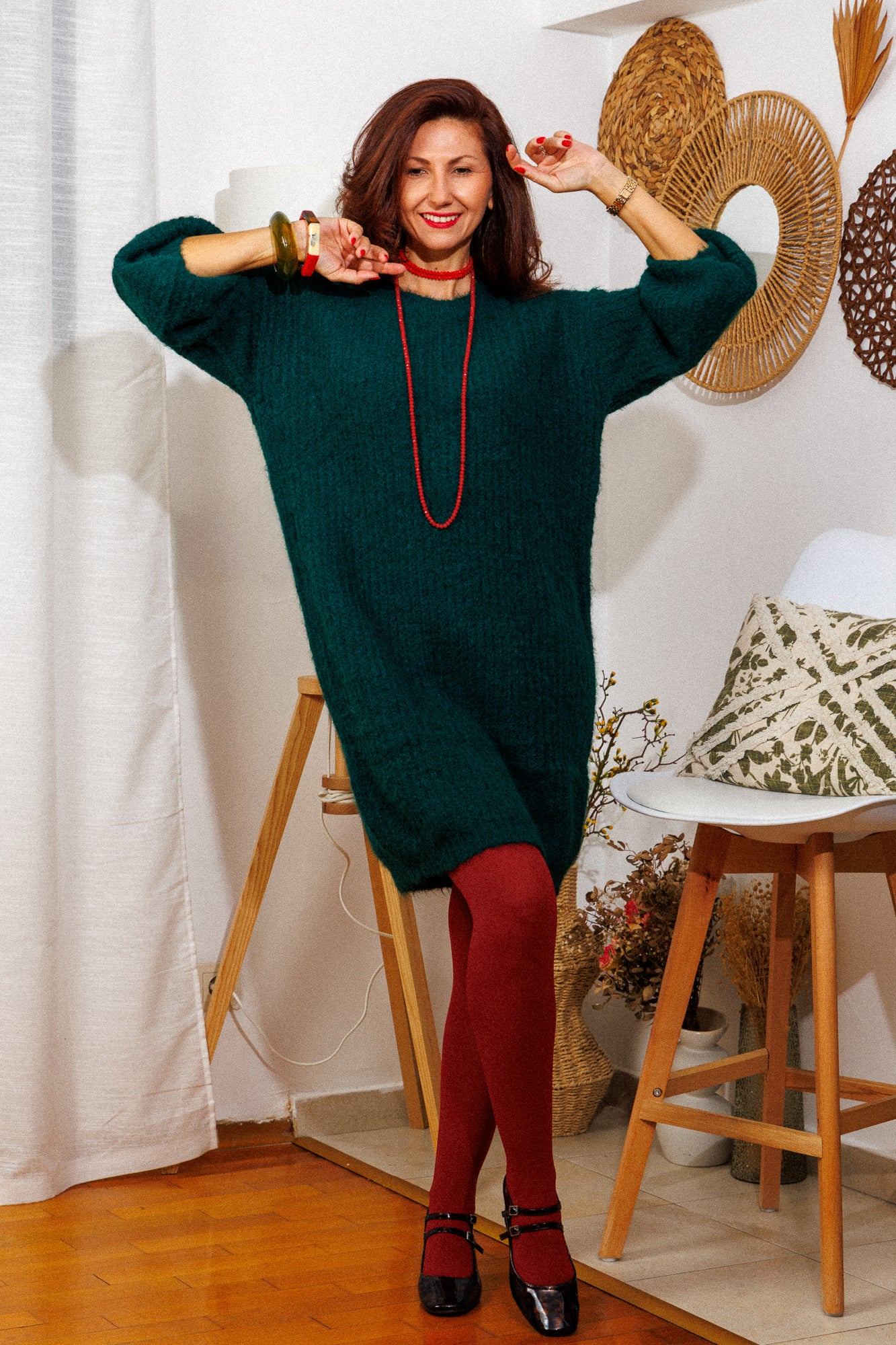 The knitted dress in a beautiful pine green color!