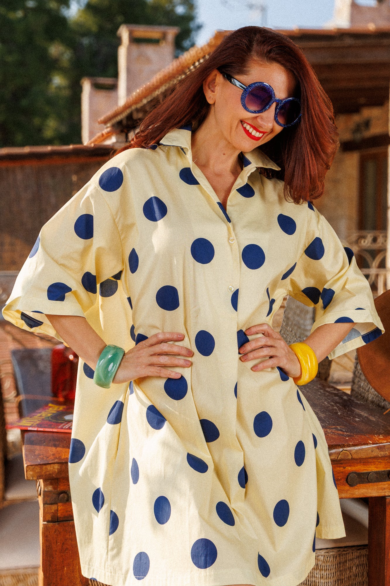 Sun-yellow dress with navy blue polka dots