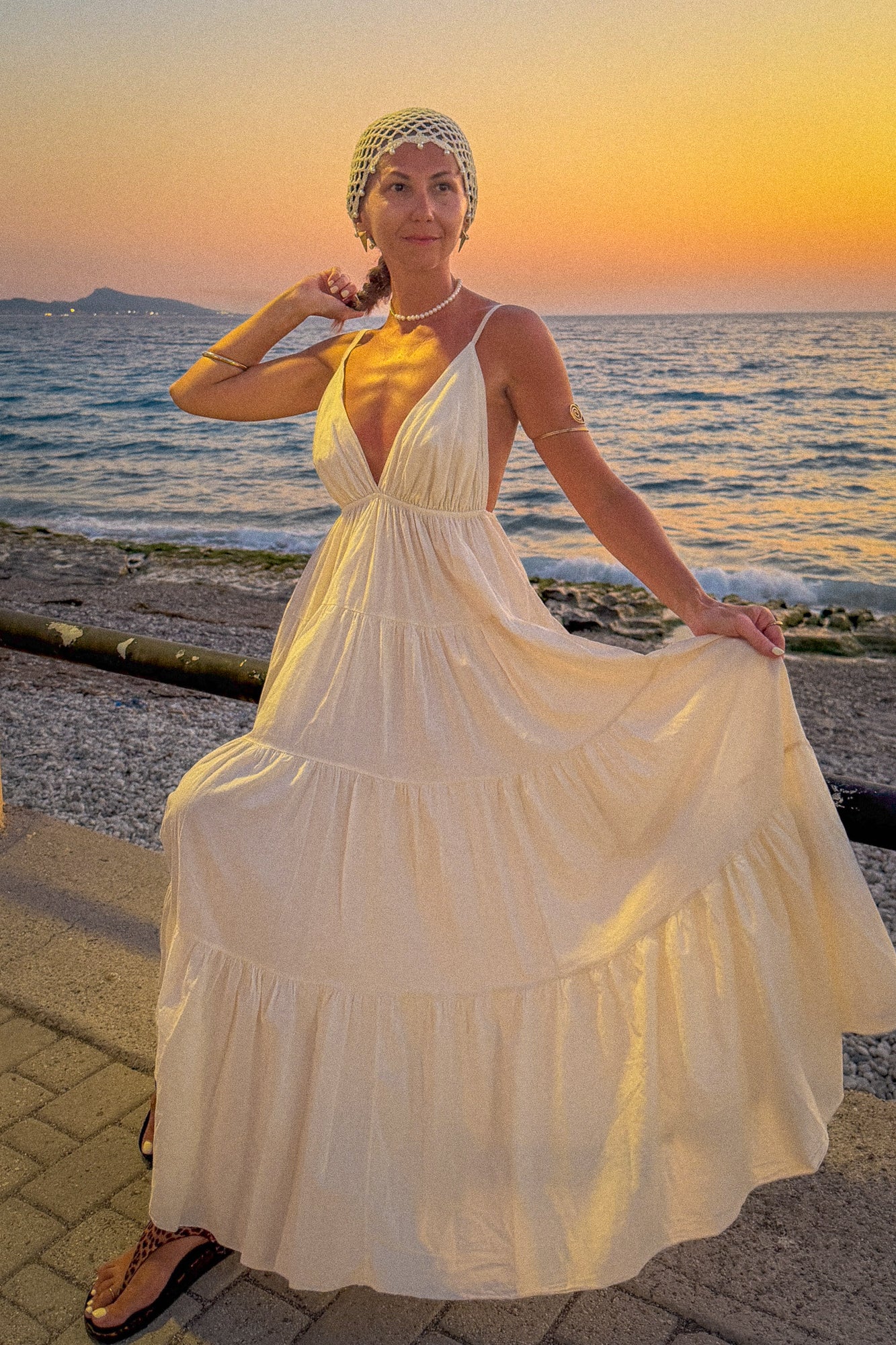 Creamy cotton maxi dress with an open back and a gorgeous flare