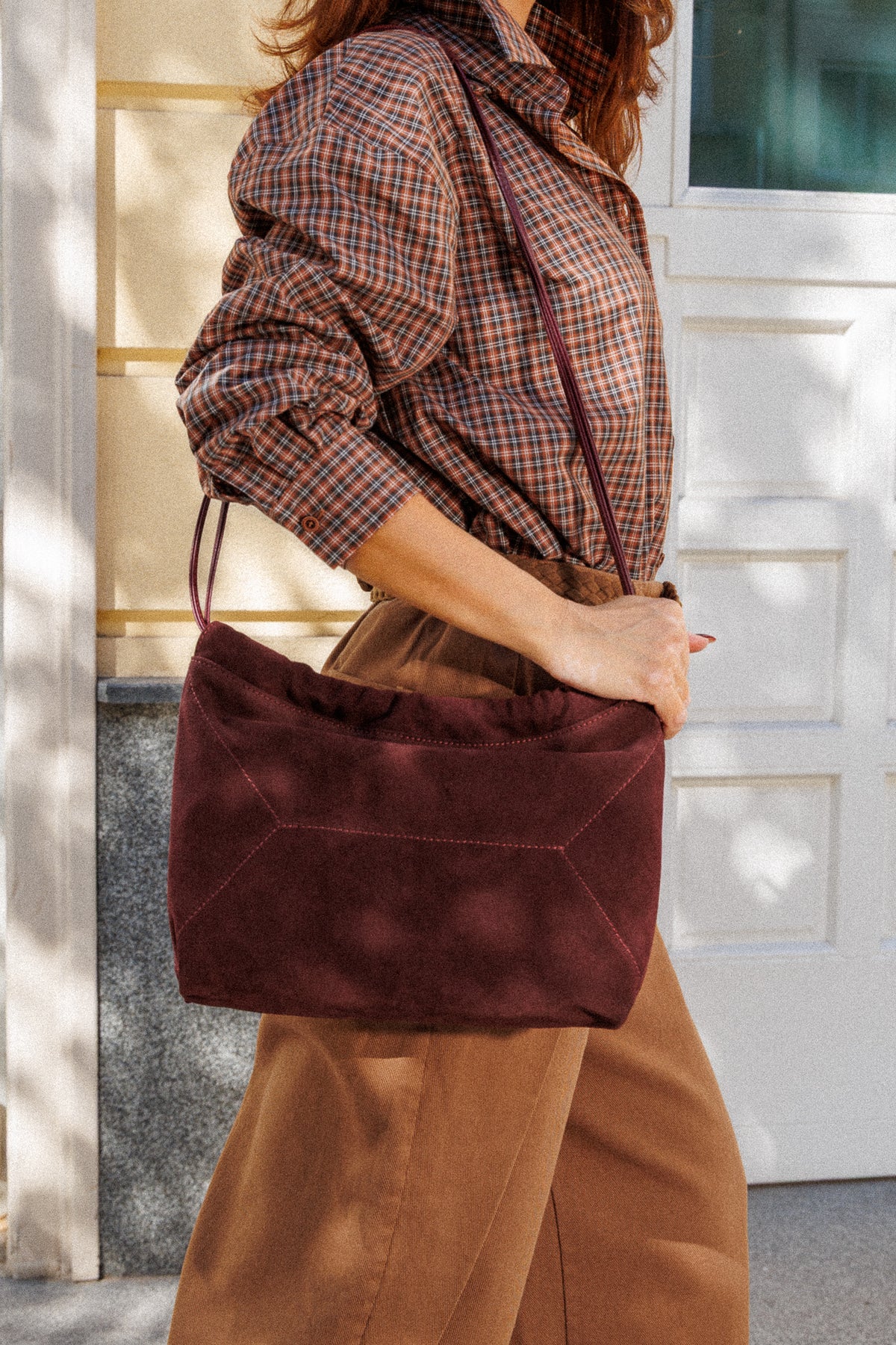 Burgundy genuine suede bag with a double handle