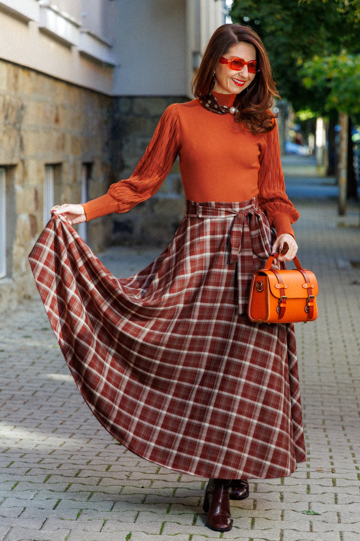 Long plaid flared skirt with a belt