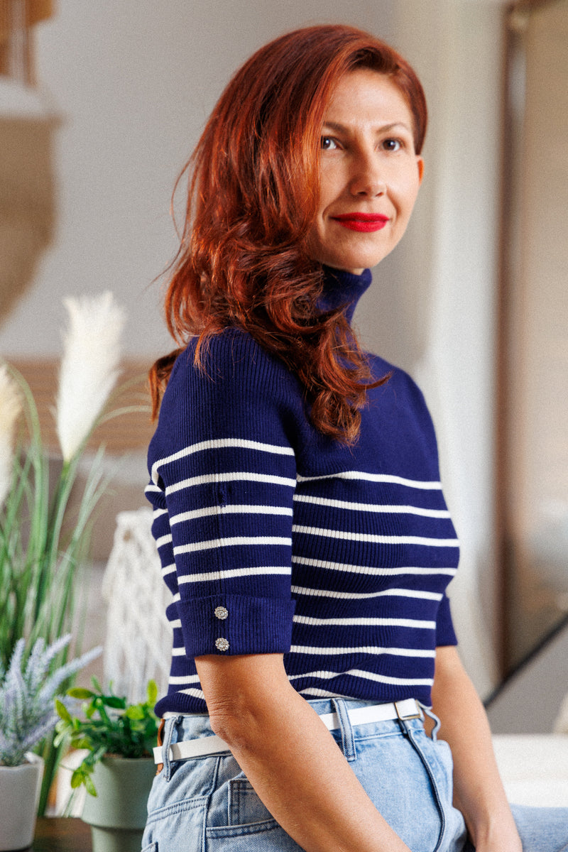 Navy blue and white striped polo shirt