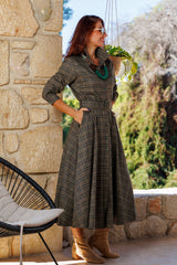 The dress in a wonderful plaid!