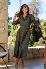 The dress in a wonderful plaid!