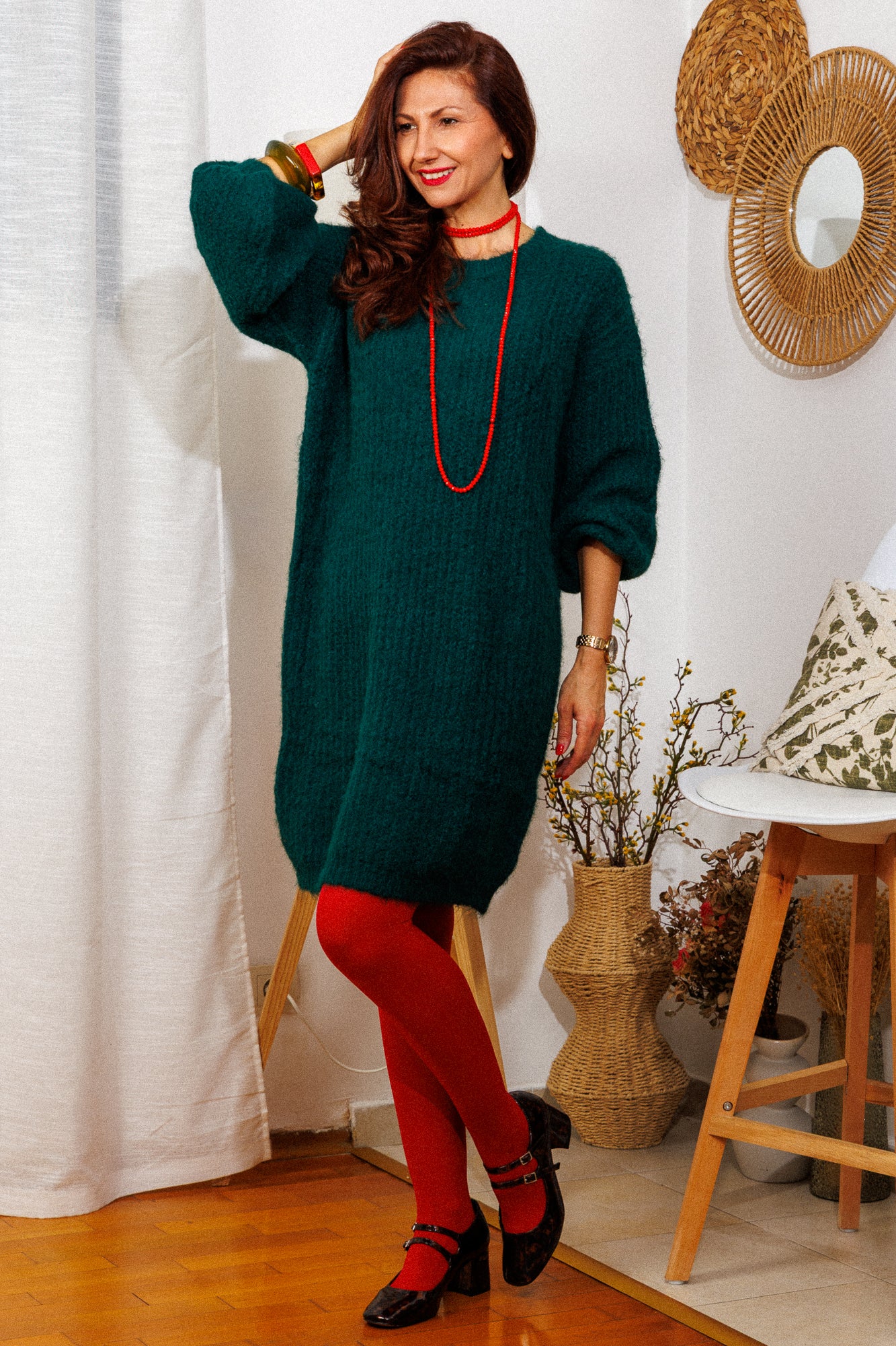 The knitted dress in a beautiful pine green color!