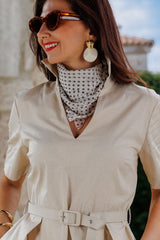 The beautiful dress with a scarf